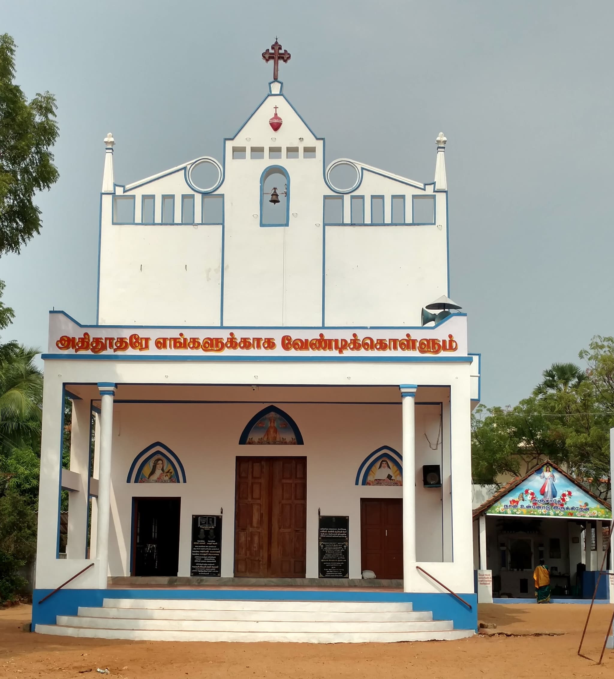 The church of St Michael the Archangel at Michaelpalayam, a Tamil banner strung across its white front